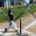 Whacking the ball into the outfield